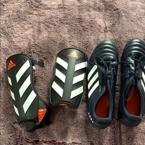 Cops soccer shoes and adidas shin pads